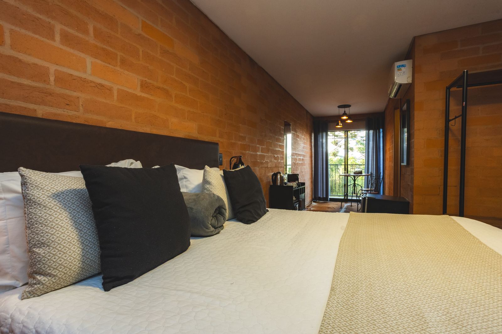 Suíte Deluxe Gazebo com varanda fechada em vidro no estilo gazebo